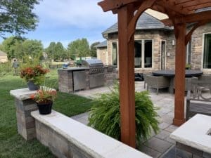 Outdoor Living Space created by The Bravo's Landscape - Outdoor Kitchen, Pergola, Patio, Furniture, and Fire Pit