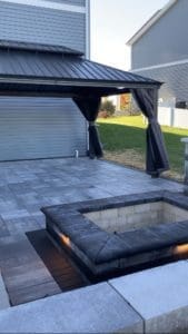 Outdoor Patio, Fire Pit, Seating Wall, and Awning