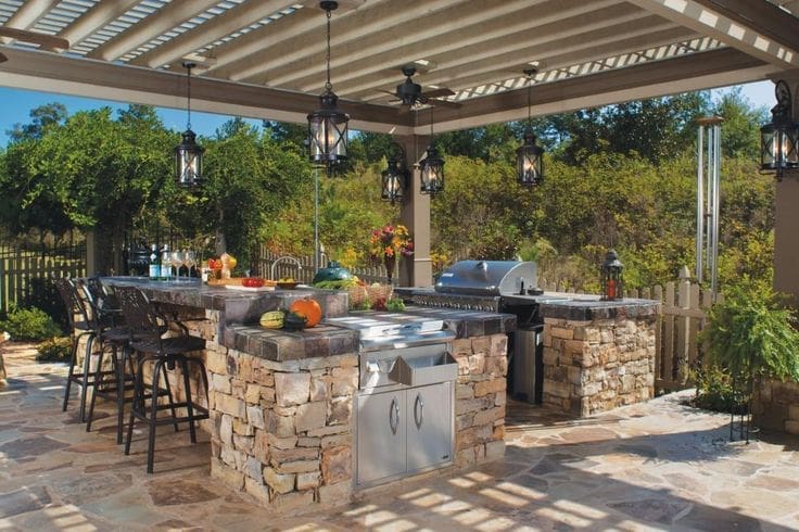 A Beautifully Designed Outdoor Kitchen & Bar Area To Complete This Premium Outdoor Living Area