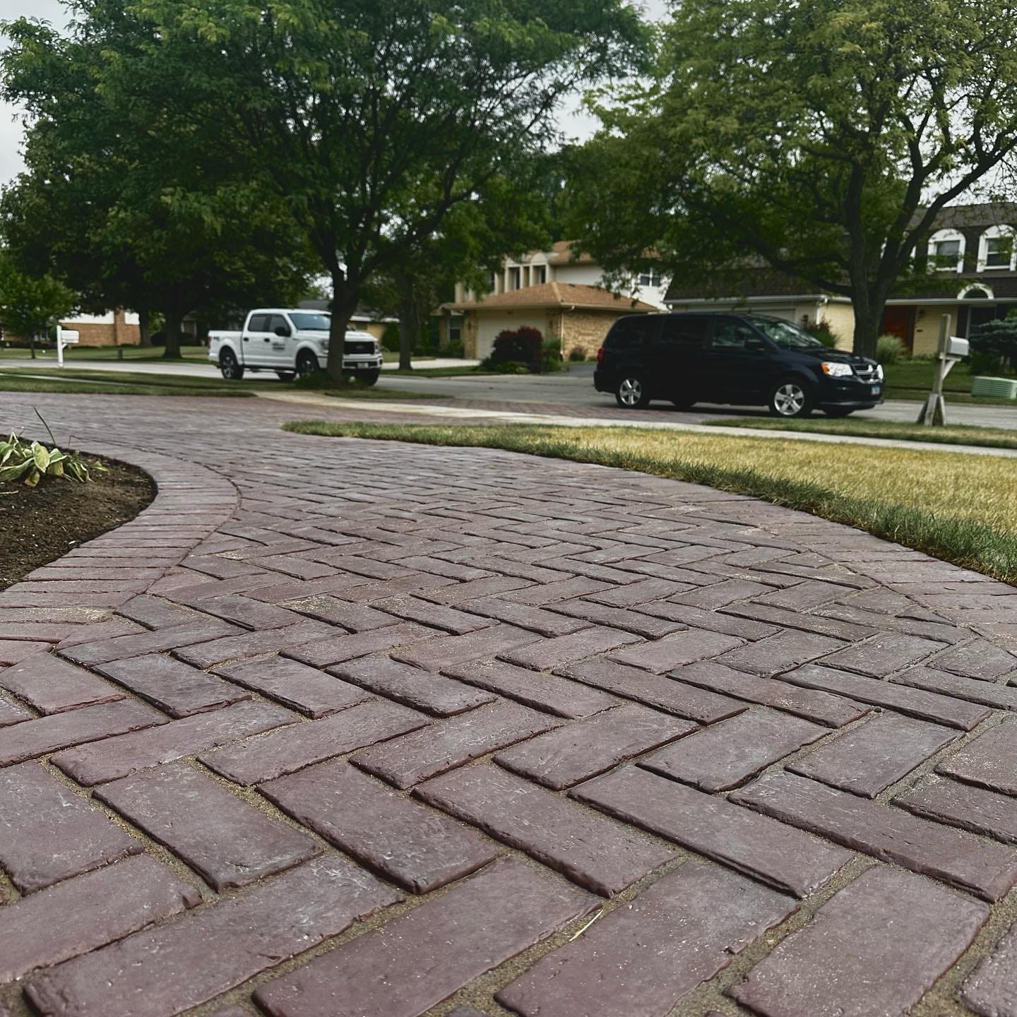 Chicago-Style Unilock Pavers Used In The Redesign & Build Of A Homeowner's Driveway In Glenview, IL Located Just North Of Chicago IL