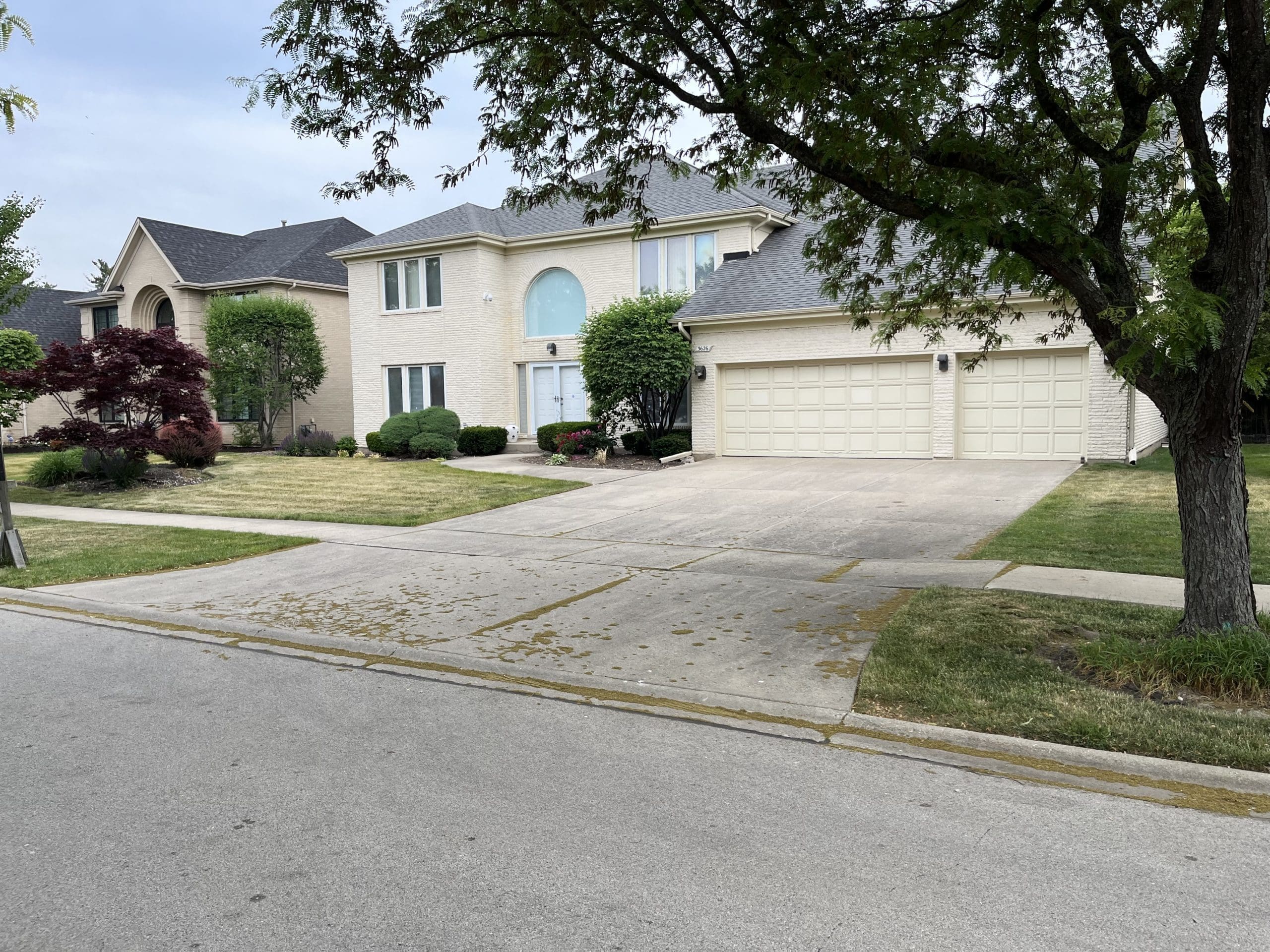 Paver Driveway Redesign Project Completed By The Bravos Landscape In Glenview IL - Before Photo 1