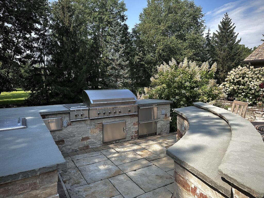 Luxury stone outdoor kitchen with blueston countertops